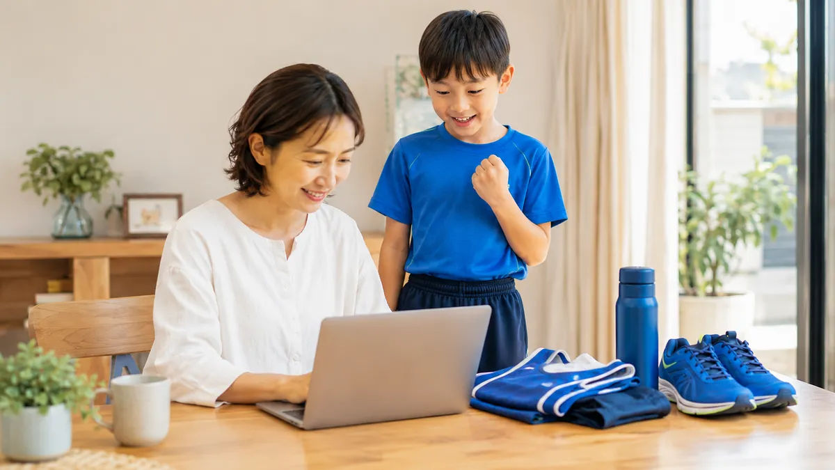 入会手続きをして喜ぶ親子
